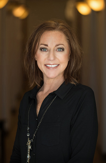 Yolanda, a compassionate dental hygienist at The Addison Dentist.