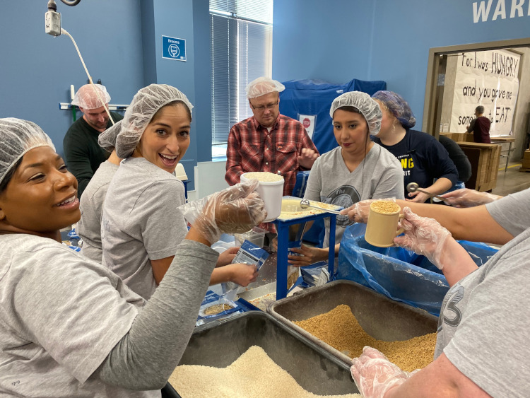 Dr. Ramirez doing charity work to serve the local Addison and Farmers Branch communities.